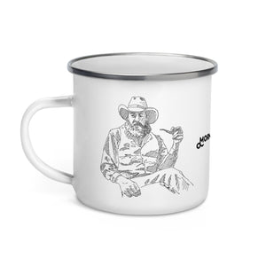 Enamel covered metal camp mug with a sketch of a Cowboy With Pipe on two sides and the phrase “Morning Pardner” in the middle. 12 oz capacity.