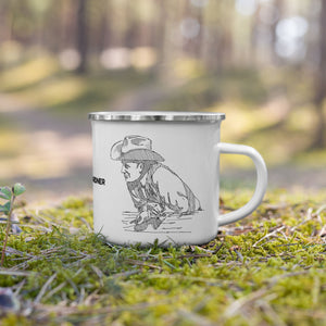 Enamel covered metal camp mug with a sketch of a Cowboy leaning on a fence on two sides and the phrase “Morning Pardner” in the middle. 12 oz capacity.