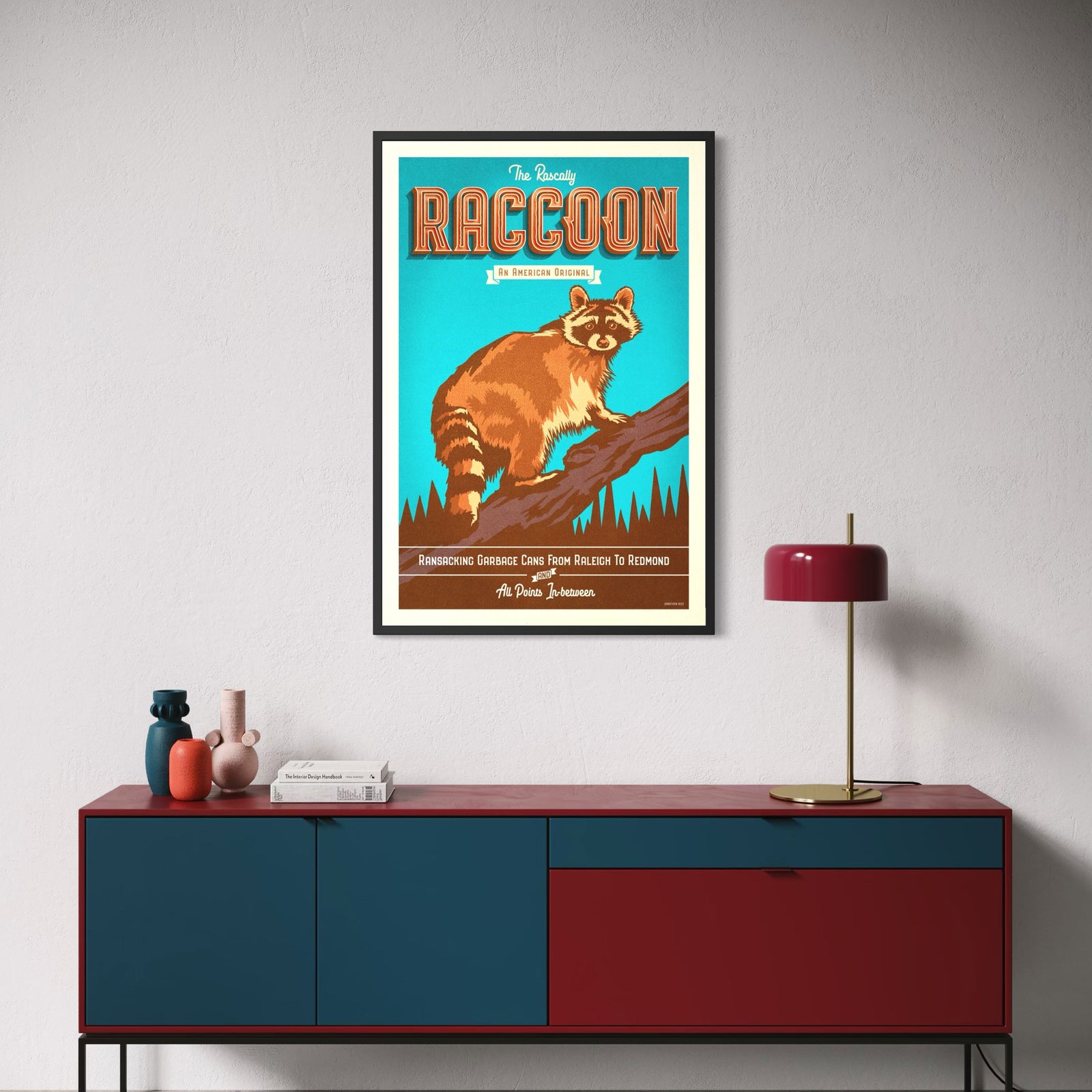 The Rascally Raccoon vintage wildlife poster featuring a raccoon perched on a tree branch against a bright turquoise background