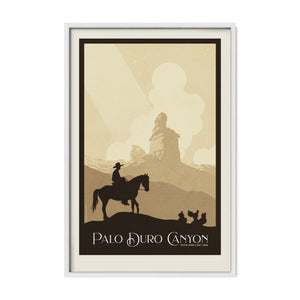 White framed Palo Duro Canyon cowboy poster featuring a vintage western illustration of a lone rider traveling through the canyon toward the iconic Lighthouse formation.