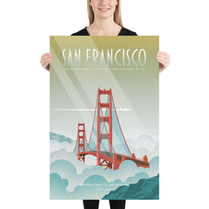 Product mockup of Illustrated travel poster featuring the Golden Gate Bridge rising out of soft blue and white fog, with sunlight streaking across a golden sky and a white jet flying above. The design has a retro, vintage texture and a mid-century modern style. Text reads “San Francisco” at the top and “Dreams Cast in Golden Fog” at the bottom.