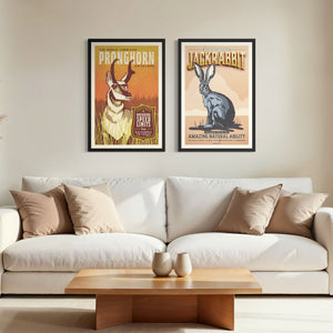 Pronghorn and Jackrabbit poster set displayed together in modern above white sofa