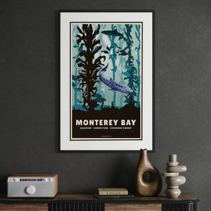 Framed Monterey Bay travel poster displayed in an office
