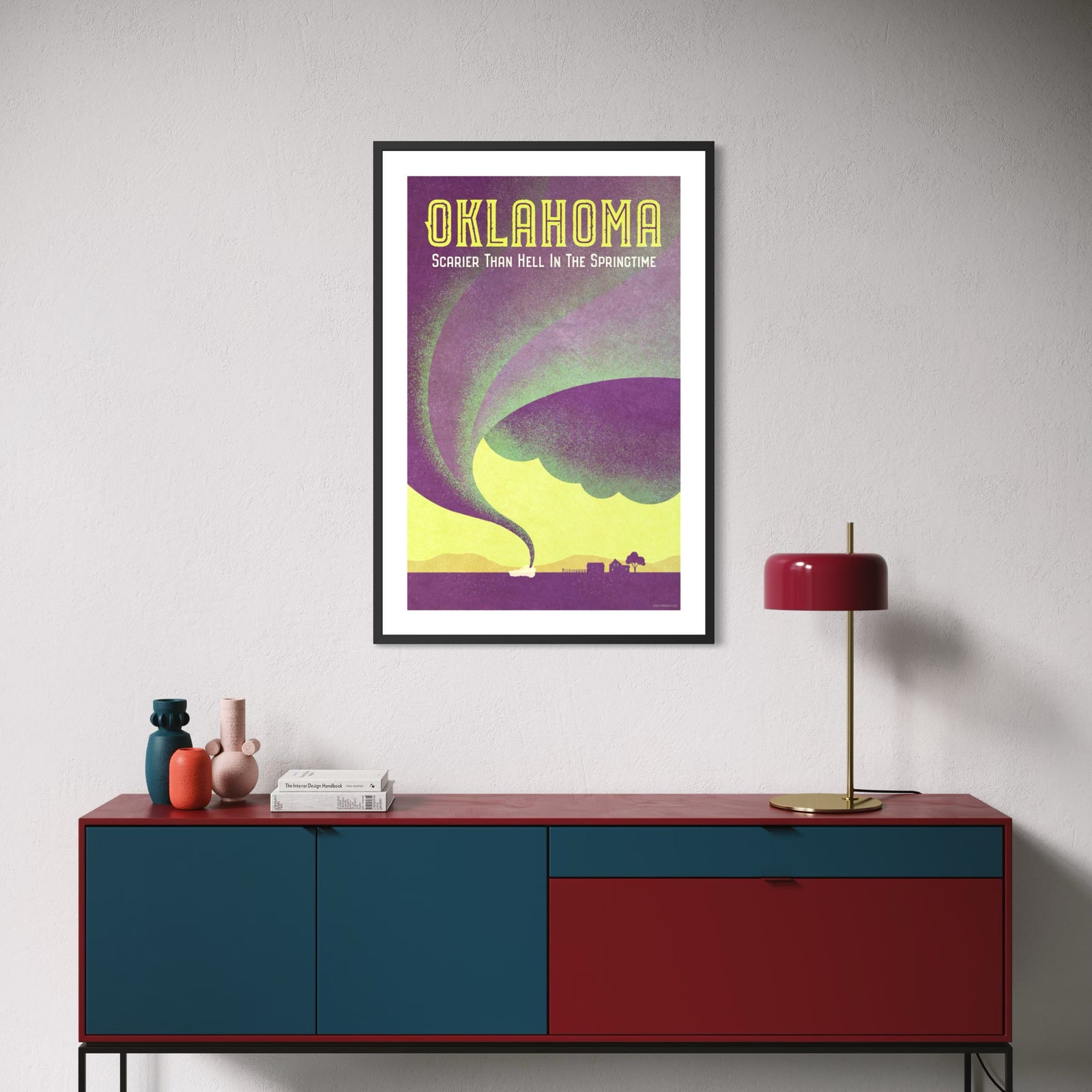 Vintage-inspired Oklahoma tornado poster featuring a massive funnel cloud sweeping across the plains toward a rural farmhouse with the words “Oklahoma – Scarier Than Hell in the Springtime.”