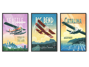 Framed aviation poster set of three in black wood frames featuring Seattle seaplane, Big Bend biplane, and Catalina Island retro airplane wall art