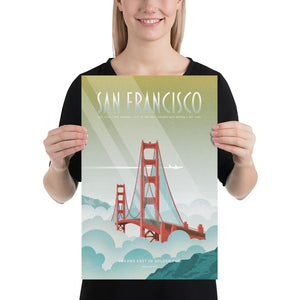 Product mockup of Illustrated travel poster featuring the Golden Gate Bridge rising out of soft blue and white fog, with sunlight streaking across a golden sky and a white jet flying above. The design has a retro, vintage texture and a mid-century modern style. Text reads “San Francisco” at the top and “Dreams Cast in Golden Fog” at the bottom.