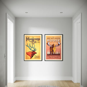 Elk and Moose North American wildlife wall art set framed together in a hallway