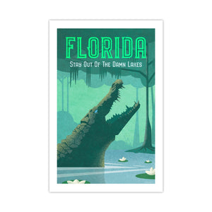 Unframed Florida alligator poster featuring a giant gator in a swamp and “Stay Out of the Damn Lakes” typography