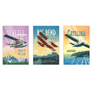 Unframed vintage aviation travel poster set featuring Seattle seaplane, Big Bend National Park biplane, and Catalina Island airplane mid century artwork
