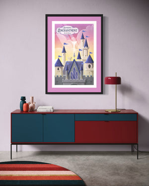 Fairy tale castle poster print in frame with pink matting, whimsical fantasy wall art styled above a modern credenza.