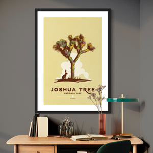 Modern, minimalist giclée art print for Modern, minimalist giclée art print for Joshua Tree National Park in California. This simple and classy poster depicts a Joshua Tree with a Jackrabbit under its’ shade. It has the words “Joshua National Park, California” at the bottom. The print’s muted overall background color allows the bold and vibrant colors of the main image to pop.