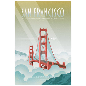 A vintage-style travel poster for San Francisco featuring the Golden Gate Bridge rising above clouds, with a pale green-to-blue gradient background and white text reading “SAN FRANCISCO” and “DREAMS CAST IN GOLDEN HOUR.”.