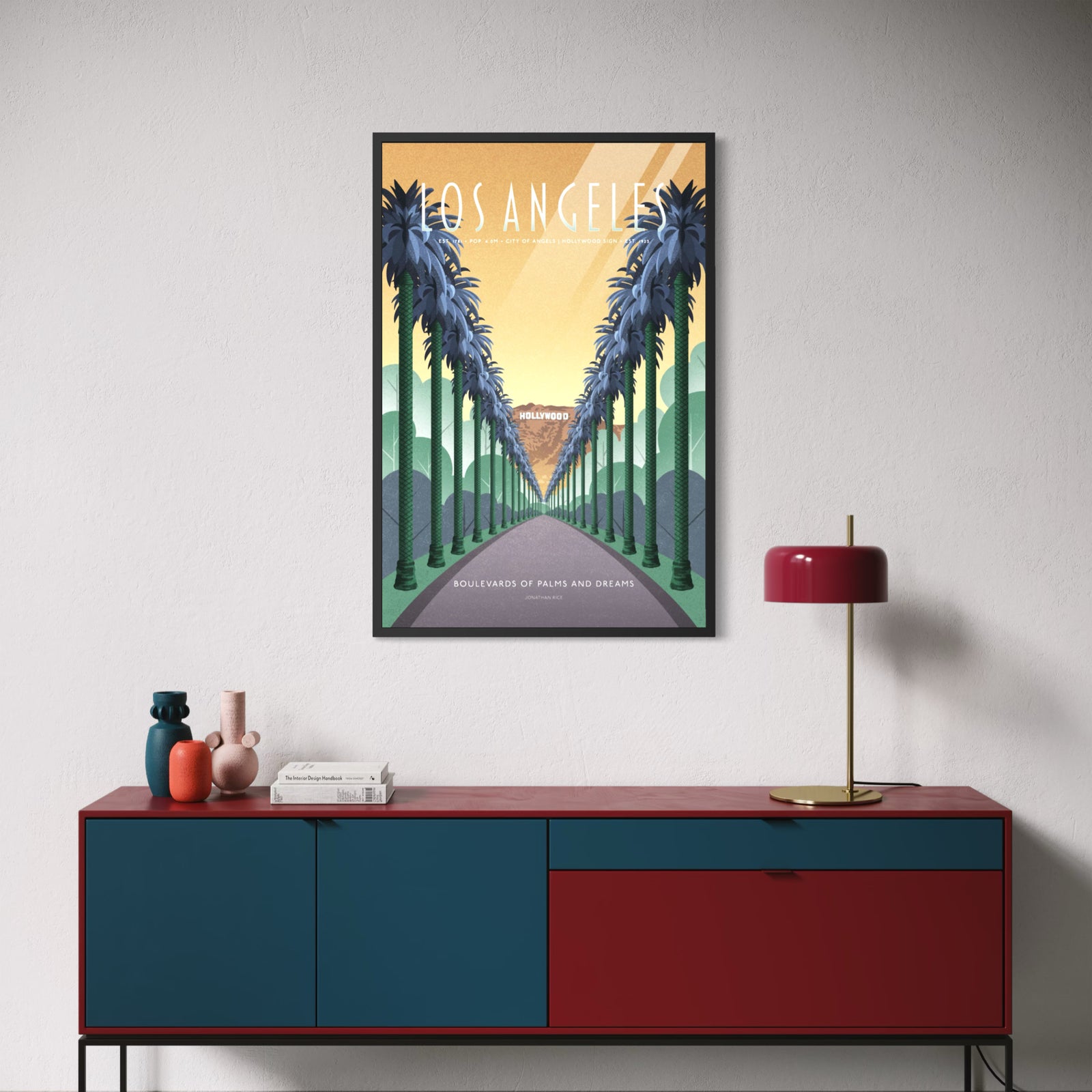 A retro-style Los Angeles travel poster featuring tall palm trees lining a straight road toward the Hollywood sign, with a warm yellow-orange sky and the text 'LOS ANGELES' and 'BOULEVARDS OF PALMS AND DREAMS'.