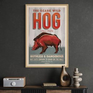 Vintage-style Wild Hog poster by Jonathan Rice oak frame room mockup