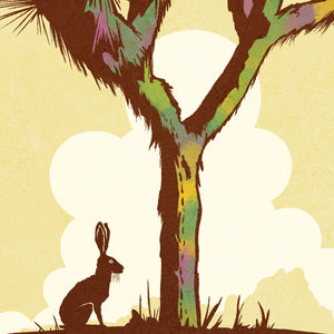 Detail of Modern, minimalist giclée art print for Modern, minimalist giclée art print for Joshua Tree National Park in California. This simple and classy poster depicts a Joshua Tree with a Jackrabbit under its’ shade. It has the words “Joshua National Park, California” at the bottom. The print’s muted overall background color allows the bold and vibrant colors of the main image to pop.