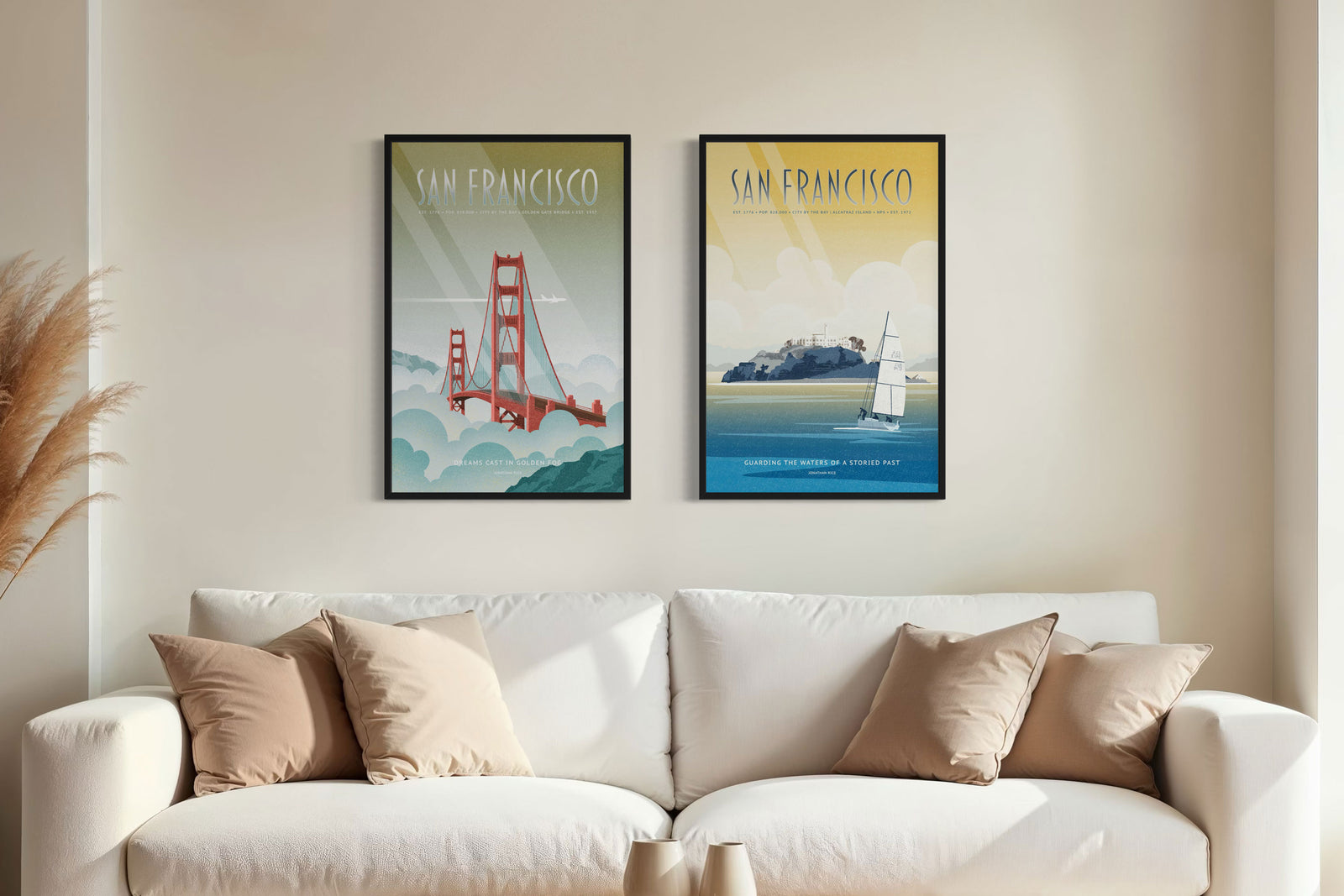 San Francisco travel poster set with Golden Gate Bridge and Alcatraz wall art above couch in a living room.