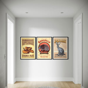 Set of three framed animal posters displayed in a hallway featuring rattlesnake, armadillo, and jackrabbit artwork