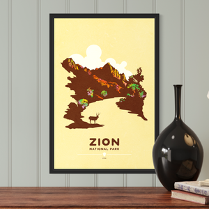 Modern, minimalist giclée art print of Zion National Park in Utah. This simple and classy poster depicts part of the Watchman Trail with a mule deer grazing beside the Virgin River.  It has the words “Zion National Park, Utah”  at the bottom. The print’s muted overall background color allows the bold and vibrant colors of the main image to pop. 