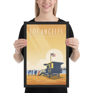 Product mockup of an Illustrated Los Angeles travel poster showing a lifeguard tower, film crew, and Santa Monica Pier at sunset in warm golden tones, retro mid-century design style.