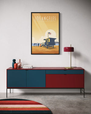 Framed Los Angeles Santa Monica State Beach art print hanging above a modern credenza, showcasing a lifeguard tower and golden California beach atmosphere.