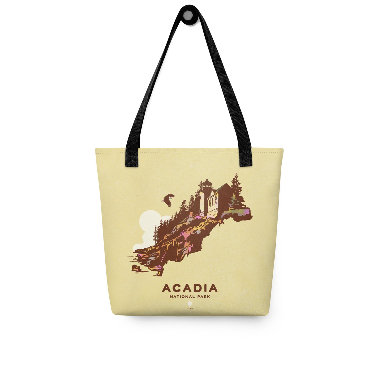 A spacious and trendy tote bag with original art by Jonathan Rice of Acadia National Park in Texas. This classy bag depicts the historic Bass Harbor Head Light Station—with a Bald Eagle flying overhead. Bag is 15” x 15” with a 11.8” handle and carry a maximum weight of 44 lbs. It makes a great gift for friends, family and National Park lovers. 