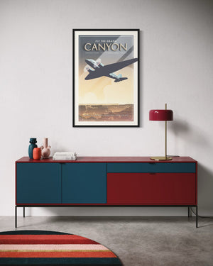 Vintage aviation poster DC3 airplane over American West canyon landscape black frame wall mockup