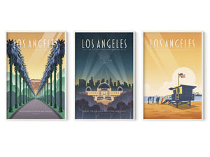 Los Angeles wall art set of three framed travel posters in white wood frames showing Hollywood Boulevard palms, Griffith Observatory, and Santa Monica Beach