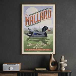 Framed Mallard duck wildlife poster displayed in a modern office workspace.