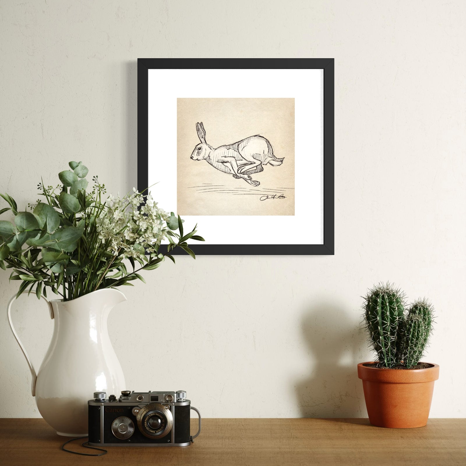 Running Rabbit sketch art print in Black Frame with Matte