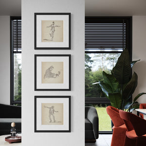 Three framed digital pen-and-ink sketches from the Music & Dance Gallery Set displayed vertically on living room columns, featuring Dancing Man No. 1, Dancing Man No. 2, and Piano Man.