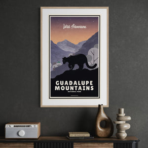 Guadalupe Mountains National Park vintage travel poster displayed in a modern office, adding warm Southwestern color and classic national park style to the workspace.