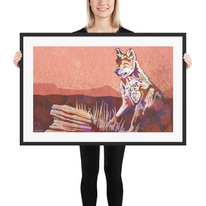 Modern style giclée art print of a Coyote standing on a rock in the wild. With its warm tones, vibrant foreground colors and gritty texture with a minimalist mountainous background. Framed Size  36" x 24"