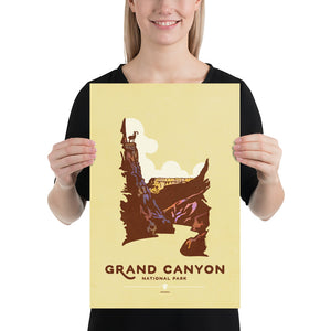 Modern, minimalist giclée art print for Grand Canyon National Park in Arizona. This simple and classy poster depicts a cross section of the Grand Canyon with a Bighorn Sheep on top of one of the edges of the canyon. It has the words “Grand Canyon National Park, Arizona” at the bottom. The print’s muted overall background color allows the bold and vibrant colors of the main image to pop.  Print size 12" x 18"