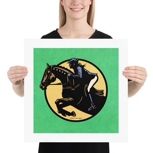 Minimalist jumping equestrian art print captures the excitement of English riding events with its’ bold colors and simple, strong lines. It is a square pint with an image of a horse and rider jumping through a graphic circle. Green Background.