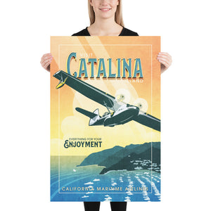 Retro style giclée art print of a PBY Catalina Flying Boat Aircraft flying over Catalina Island, California. It has the words “Visit Catalina Island” at the top. The print’s cool blues and greens combined with the warm sunset sky creates a stunning backdrop for the classic flying boat with bright cool color and yellow highlights. There are additional words a the bottom that says “Everything for your Enjoyment. California Maritime Airlines.” Print size 24" x 36"