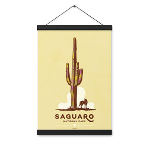Modern, minimalist giclée art print for Saguaro National Park in Arizona. This simple and classy poster depicts a saguaro cactus with a lone coyote. It has the words “Saguaro National Park, Arizona” at the bottom. The print’s muted overall background color allows the bold and vibrant colors of the main image to pop. Size 12" x 18" with Poster Hanger