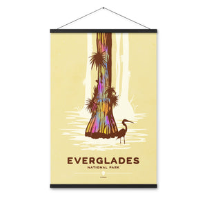 Modern, minimalist giclée art print for Everglades National Park in Florida. This simple and classy poster depicts a Great Blue Heron wading in the waters next to cypress trees.  It has the words “Everglades National Park, Florida” at the bottom. The print’s muted overall background color allows the bold and vibrant colors of the main image to pop. 