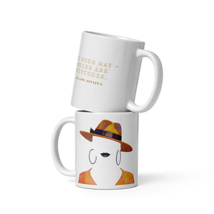 Coffee mug with a portrait of a woman’s fedora hat with singer Frank Sinatra quote on the other side. 
