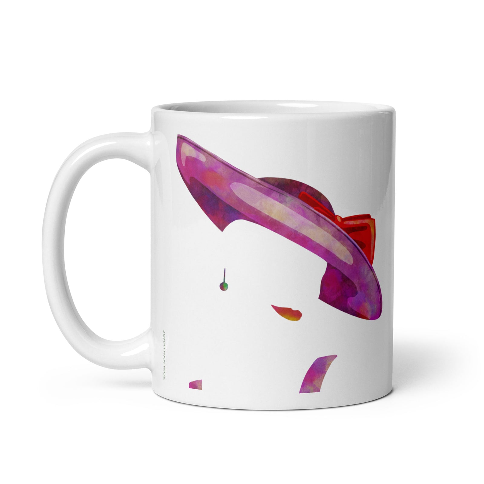 Coffee mug with a portrait of a woman’s royal wedding hat with Virginia Graham quote on the other side. 