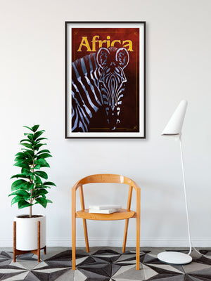 Bold graphic giclée art print of an African Zebra. Print shows an African Zebra blending into a dark background and overlapping the word “Africa”.