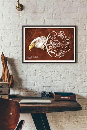 Bold graphic giclée art print of a Bald Eagle. Print is a portrait of a Bald Eagle soaring next to a beautiful graphic ornament on a red background with the words “Bald Eagle” below.