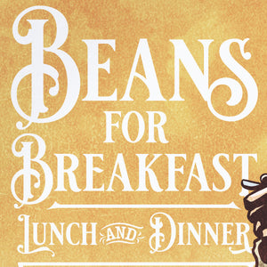 Detail of Bold graphic giclée art print of a Cowboy eating breakfast with the words “Beans for Breakfast”. Print is an ink portrait, with color, of a cowboy seated on the grounded with a plate of beans in hand. 