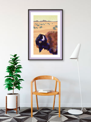 Modern style giclée art print of an American Bison on the plains. It has rich colors and gritty texture with a herd of bison and mountains in the background.
