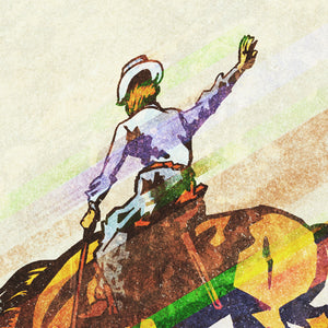 Detial of Retro styled art print of Bronco Busting. The prints depicts a cowboy riding a bronco. The bold graphic lines are complemented by colorful streaks giving the piece a sense of movement. The print has the words “Bronco Busting” on it.