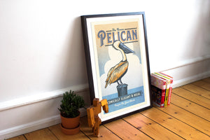 Vintage style humorous Brown Pelican art print standing on a pier with clouds in background.  The poster has ornate typography inspired by old travel, national parks and wildlife posters.