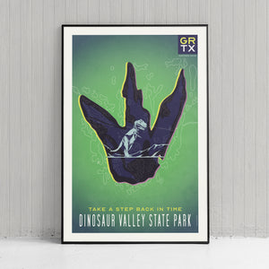 Bold graphic giclée art print of a Dinosaur foot print with T-rex inside and the words “Take a Step Back in Time. Dinosaur Valley State Park”. Print is predominately yellow green with deep purple accents.