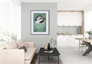 Bold graphic giclée art print of a Peregrine Falcon. Print is a portrait of a Peregrine Falcon adorning the top of a beautiful graphic ornament on a green background with the words “Peregrine Falcon” below.