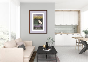 A retro style giclée art print of an Egret in a marsh in Galveston Island State Park. It has the words “Wade Through Nature” at the top. The print primarily is in bold black with bright colors. There are additional words a the bottom that says “Galveston Island State Park, Galveston”.