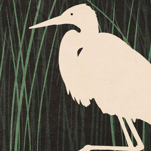 Detail of A retro style giclée art print of an Egret in a marsh in Galveston Island State Park. It has the words “Wade Through Nature” at the top. The print primarily is in bold black with bright colors. There are additional words a the bottom that says “Galveston Island State Park, Galveston”.