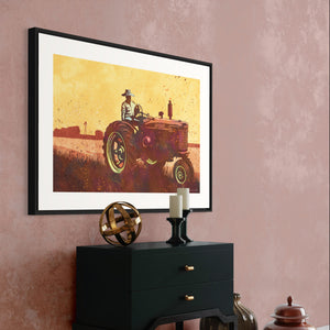 Modern style giclée art print of an old Tractor in a field. It is brightly colored, yet has gritty texture overall. There is a field and farm house with barn in the background.